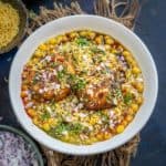 Ragda Pattice (Ragda Patties) is a popular Indian street food where crispy potato patties are topped with white peas curry, chutneys, onion, and sev. It is very popular in the states of Gujarat and Maharashtra (vegan).