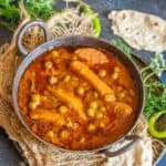 Make this spicy Punjabi-style Aloo Matar Curry (Green Peas Potato Curry) at home using my easy recipe. You can make this recipe in a traditional stovetop pressure cooker or in an instant pot (vegan, gluten-free).