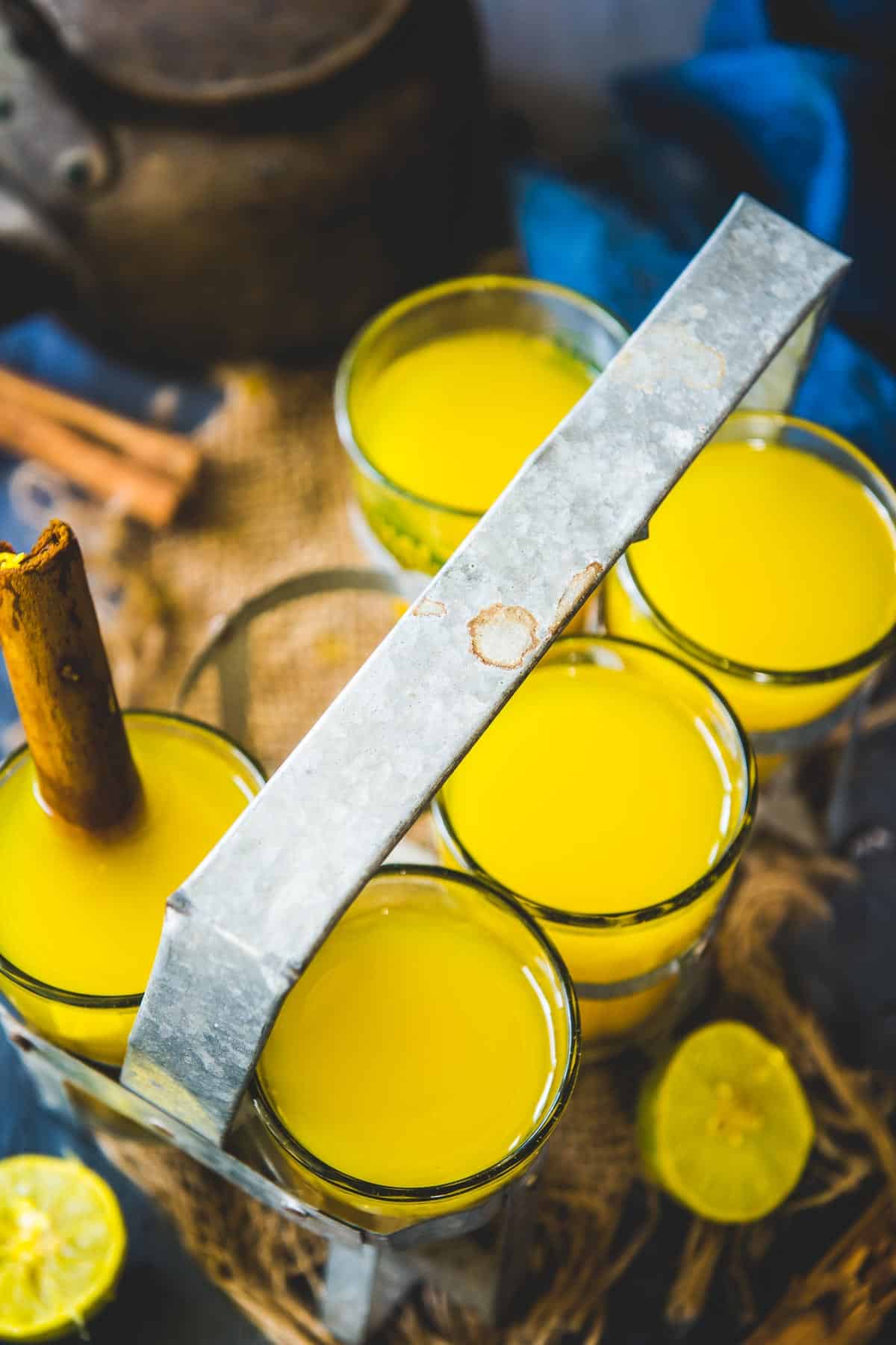Turmeric ginger tea served in a glass.