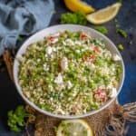 Tabouli Salad (Tabbouleh) is a traditional Mediterranean (Middle Eastern Salad) made using bulgar wheat, fresh parsley, and vegetables tossed in a tangy lime juice dressing. It is refreshing, light, and full of flavors (vegetarian).