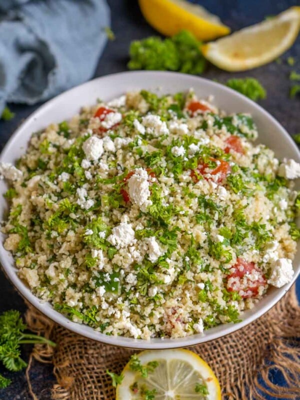 Tabouli Salad (Tabbouleh) is a traditional Mediterranean (Middle Eastern Salad) made using bulgar wheat, fresh parsley, and vegetables tossed in a tangy lime juice dressing. It is refreshing, light, and full of flavors (vegetarian).