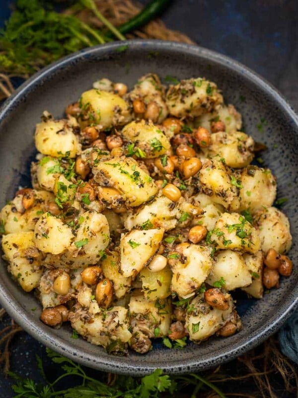 Vrat Wale Sookhe Aloo is a gluten-free dry sabji made using potatoes and peanuts. It is served as a snack on vrat (Hindu fasting) days. You can also serve it as a side dish with any Indian meal.