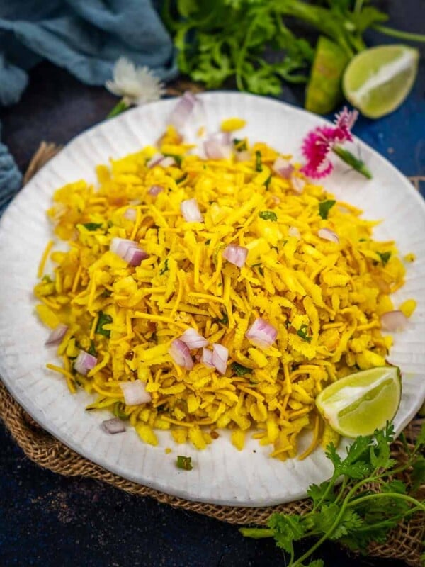 Poha Bhel is a healthy snack that you must try. It is easy to make, vegan and great to munch along with tea or coffee. Here is how to make it.