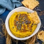 This Boar's Head Copycat Pumpkin Pie Dessert Hummus is a sweet dip that will become your go-to fall dessert once you try it! It's an inviting combination of real pumpkin puree, warming fall spices, chickpeas, tahini, and vanilla extract (vegan & gluten-free).