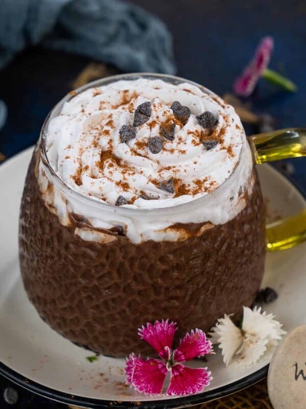 Pumpkin Spice Hot Chocolate is a delicious twist on classic hot chocolate. Loaded with warm and cozy fall flavors, it is rich and creamy and comes together in just 10 minutes. Here is how to make it.