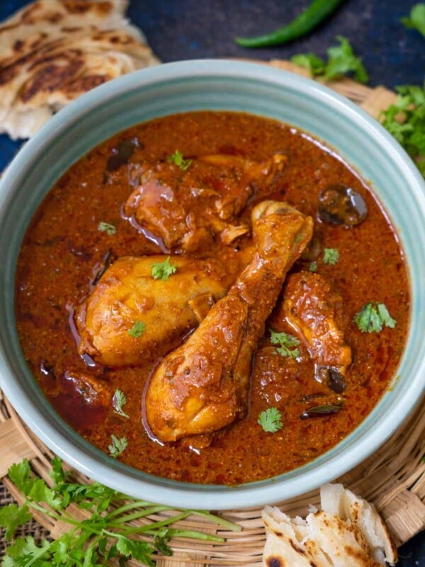 Andhra Style Chicken Curry (Kodi Kura) is a spicy and flavorful chicken curry from the South Indian state of Andra Pradesh in India. This curry gets its unique flavor from the freshly roasted spice mix. Here is how to make it in the traditional style.