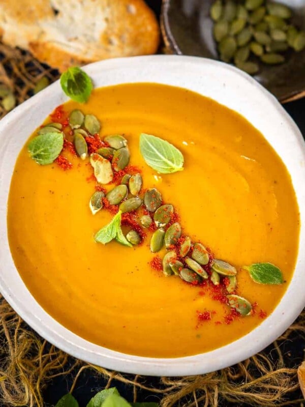This spicy Roasted Butternut Squash Sweet Potato Soup has become my new fall favorite. Make it in under an hour for a hearty meal (vegan, gluten-free).