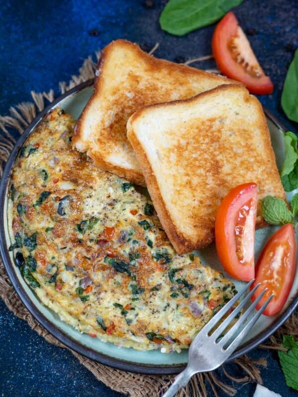 Greek Omelette is a classic Greek egg recipe loaded with spinach and feta cheese. It comes together in under 10 minutes and is great to serve for breakfast or brunch (keto-friendly, gluten-free).