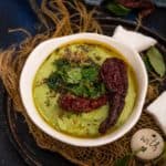 Mint Coconut Chutney is a delicious take on the classic South Indian coconut chutney where fresh mint leaves are added to it for a refreshing taste. Serve it with idli, dosa or uttapam. Here is how to make it.