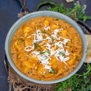 Paneer Lababdar is a luscious North Indian curry in which paneer cubes and grated paneer are simmered in a rich and creamy onion-tomato gravy. Use my easy recipe to make this restaurant-style dish at home.