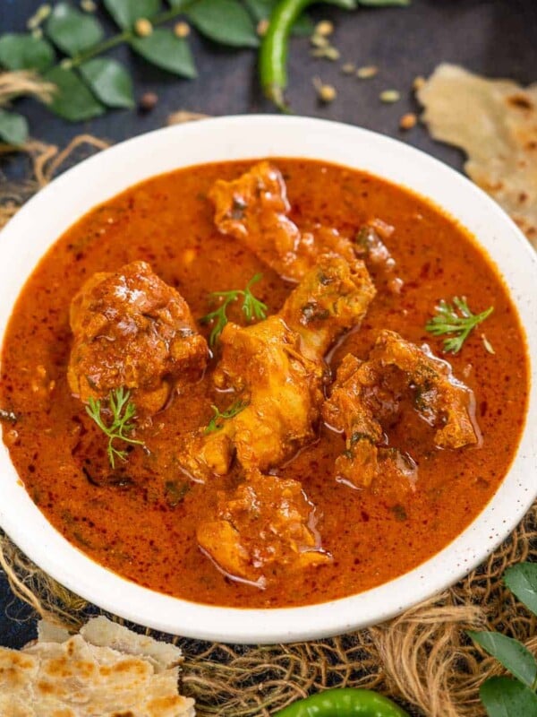 Chicken Salna is a thin and spicy chicken curry from Tamil Nadu, a Southern state of India. It tastes delicious with flaky parotta or steamed rice. Here is how to make it.