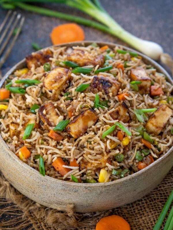 Paneer Fried Rice is an Indo-Chinese style rice stir fry dish where rice is stir-fried with paneer, sauces, and lots of crunchy veggies. Make it at home using my easy recipe (vegetarian).
