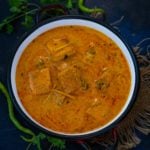 Dahi Paneer is delicious and spicy paneer (Indian cottage cheese) curry made using yogurt as the base. It is easy, quick, and comes together in just 30 minutes. Here is how to make it.