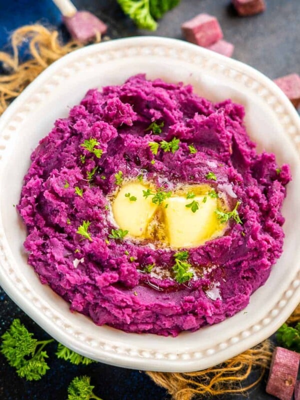 These Instant Pot Mashed Purple Sweet Potatoes are so vibrant and colorful, that you immediately feel like eating them. These are creamy, nutritious, and come together in under 50 minutes (vegetarian, gluten-free).