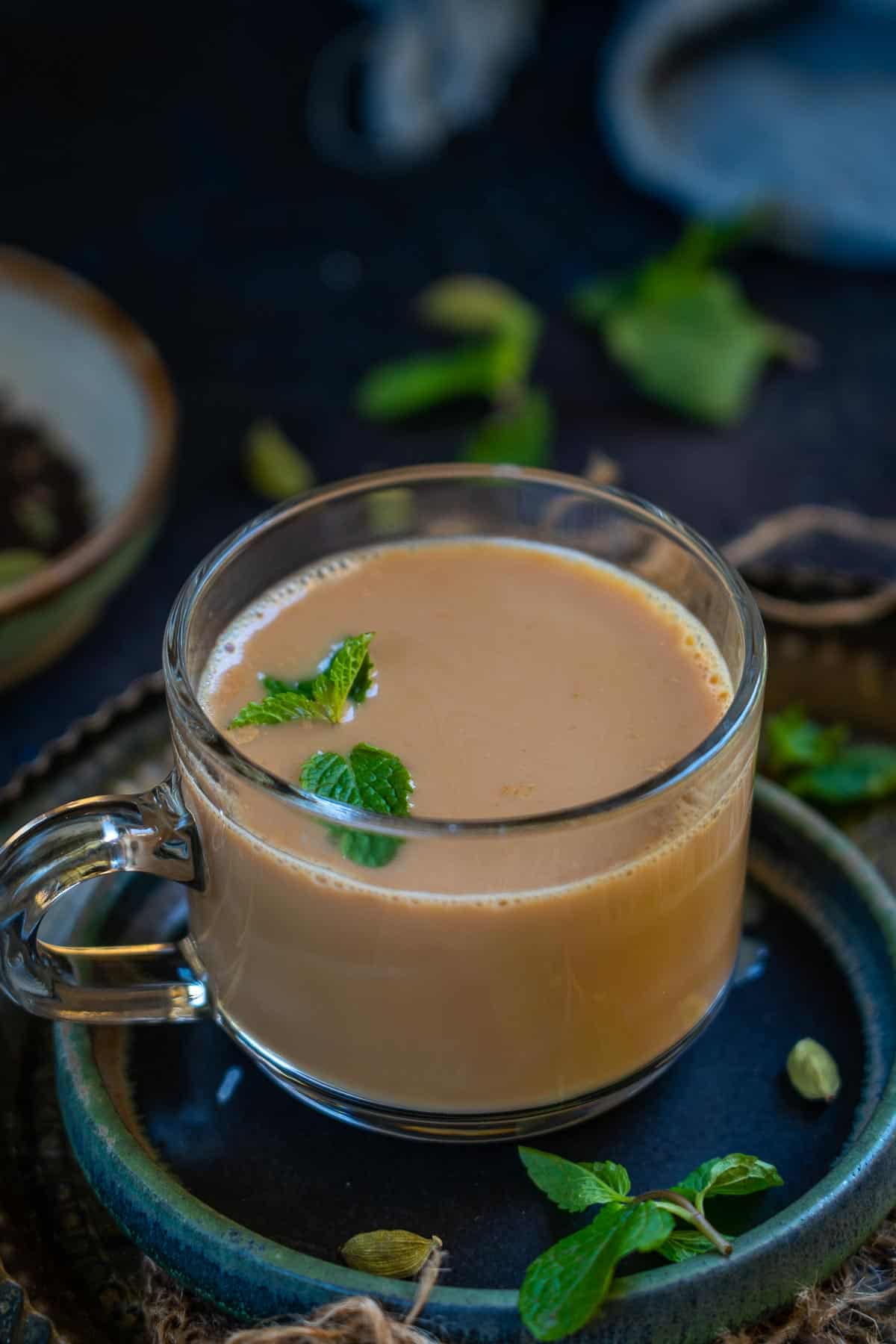 Pudina chai served in a cup.