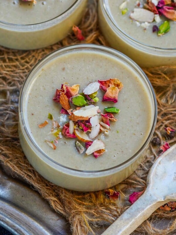 Paan Pannacotta is a fusion dessert where pannacotta is flavored with betel leaves (paan), gulkand (rose jam) and Thandai powder. Make this delicious dessert this Holi