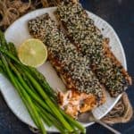 Furikake Salmon is a delicious and healthy recipe where Salmon fillets are coated with a layer of Furikake seasoning and baked or air fried until cooked to perfection. Serve it with rice or wrap in nori sheets with rice to make sushi rolls. Here is how to make it.
