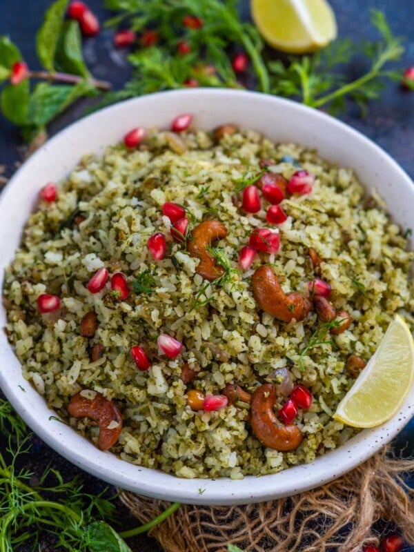Green Poha (Hariyali Poha, Kothamali Poha) is a delicious Indian breakfast recipe made using poha (flattened rice), herbs, and spices. Serve it with a cup of masala chai.