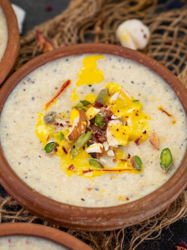 Kesar Makhana Phirni is a delicious twist on the classic Phirni recipe where instead of rice, roasted makhana (foxnuts) are added to milk. It is a perfect recipe to make for festivals, special occasions, and vrat (Hindu fasting days). Here is how to make it.