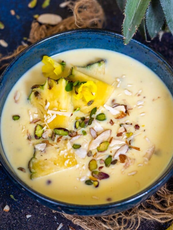 Pineapple Basundi is a delicious fruity twist on the classic basundi recipe. Serve it for festivals and special occasions. Here is how to make it.