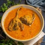 Baingan ka khatta served in a bowl.