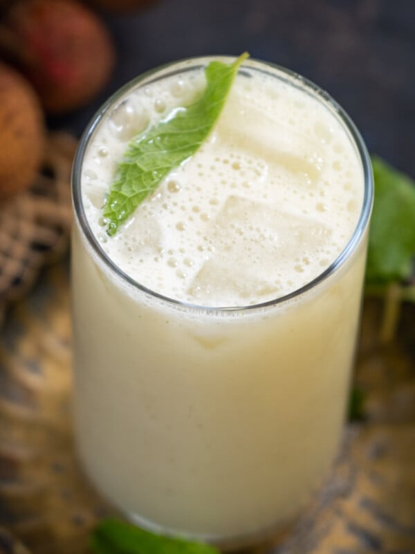 Make Lychee Juice (Litchi Juice) at home using 3 ingredients in under 10 minutes. Serve this refreshing tropical drink for breakfast or snacks (vegan, gluten-free).
