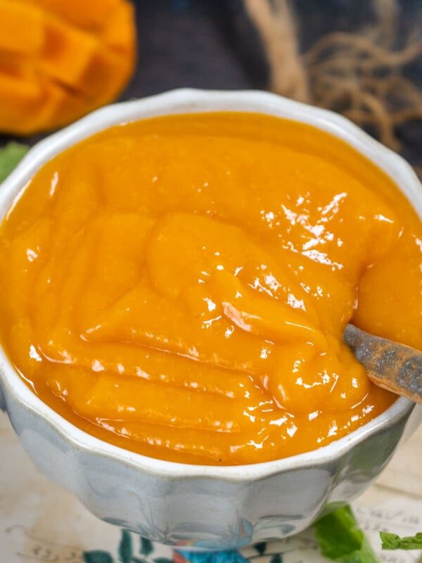 This easy Mango Coulis Recipe (Mango Sweet Sauce) comes together in under 30 minutes using just 3 ingredients. Top this super versatile sauce over overnight oats, cheesecakes, ice cream, or any other dessert of your choice (vegan, gluten-free).