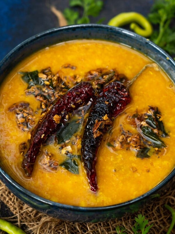Masoor Ki Khatti Dal is a Hyderabadi style lentil recipe where pink masoor dal is cooked with tomatoes, tamarind pulp, and a few more simple ingredients. Make it using my easy recipe.