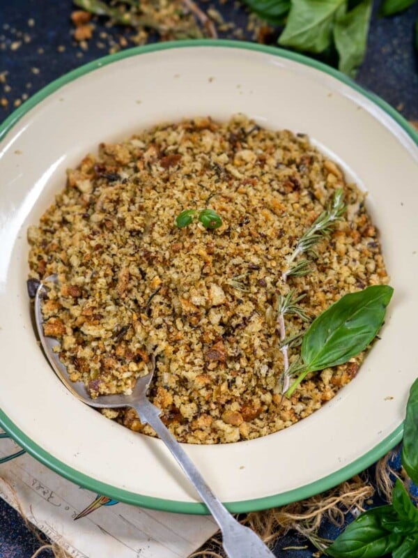 These Oven Baked Pangrattato (Italian Flavored Breadcrumbs) are crispy crunchy breadcrumbs flavored with garlic and fresh herbs. Make them from scratch using my easy recipe.