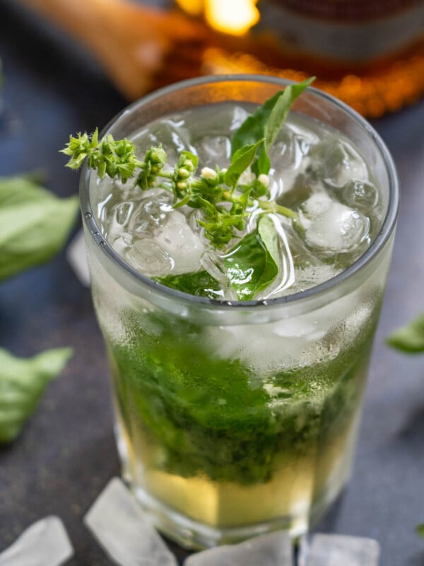 Basil Julep is a refreshing cocktail made using basil and whiskey. It is a take on the classic mint julep. Make it using my easy recipe.