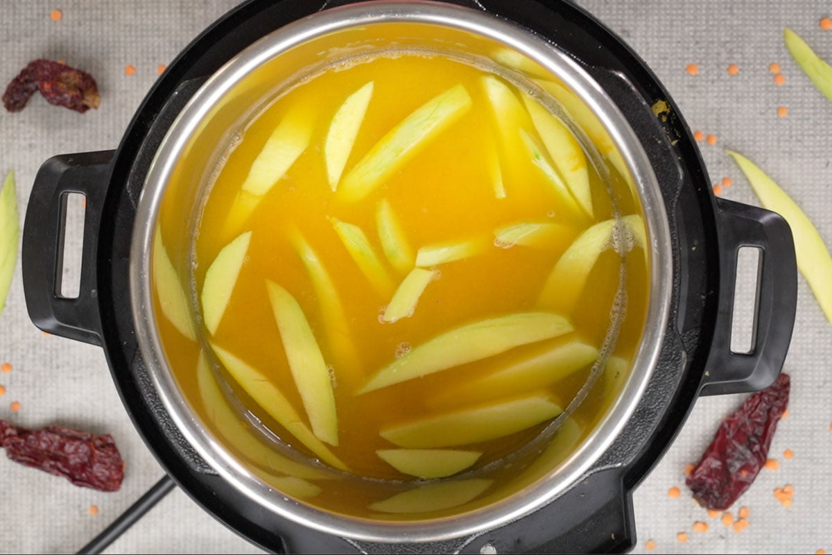 Tok Dal Recipe  Kancha Aamer Diye Tok Dal    Whiskaffair - 61