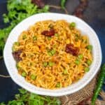 This Cheesy Tadka Maggi is so addictive, that you will want to eat it again and again. Enjoy it on a cozy monsoon or winter day with a hot cup of masala chai. Here is how to make it.