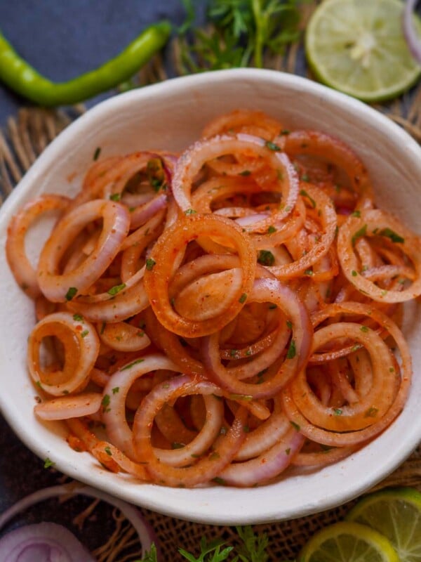 Laccha Onion (Lachha Pyaz) is an Indian condiment made using red onions and a few herbs and spices. It is popularly served along with North Indian meals (vegan. gluten-free).