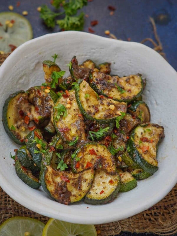 No flour, no breading, and less oil, this Air Fryer Parmesan Zucchini is an easy, quick, and healthy recipe to serve as a snack or side dish (gluten-free, vegetarian).