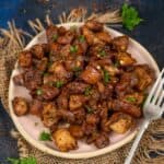 This Honey Butter Garlic Chicken is loaded with sweet, spicy, and savory flavors. Make it in under 30 minutes using a few simple ingredients (gluten-free).