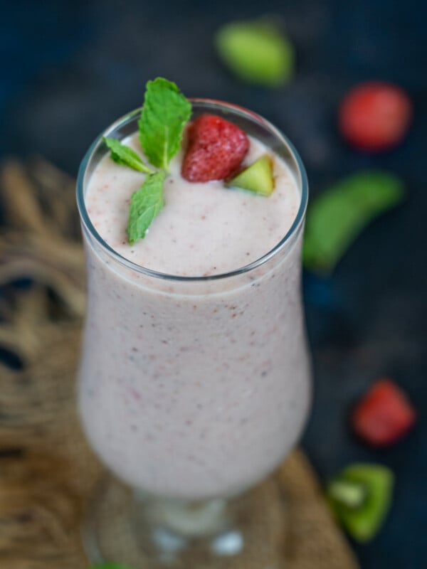 Kiwi Quencher Tropical Smoothie is a refreshing drink perfect to serve for summer breakfast or a mid-day snack. Made using 5 simple ingredients, this recipe is gluten-free and can be easily made vegan.
