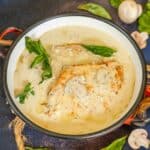 Pesto cream cheese chicken served on a plate.