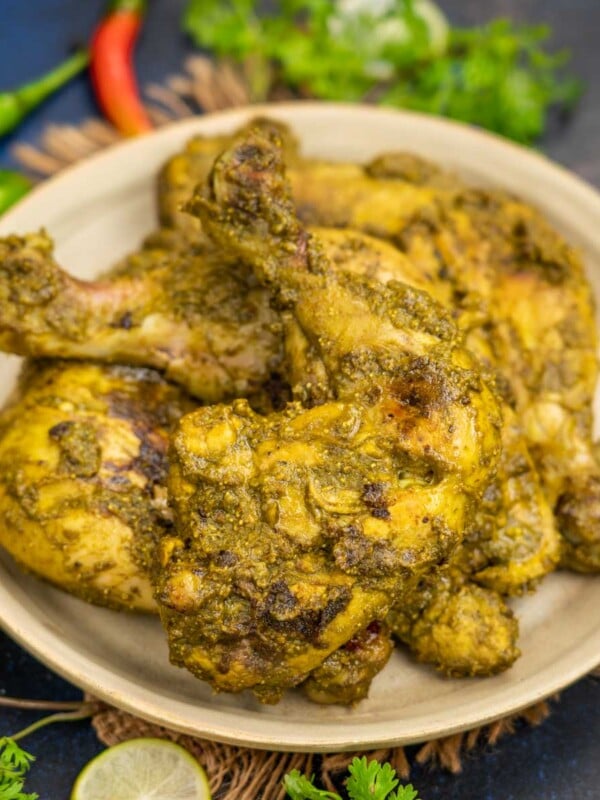 Goan Chicken Cafreal is a spicy, tangy, and rustic preparation where chicken is marinated in a green-colored Cafreal paste before cooking. It is a traditional Goan recipe made in almost all Goan homes.