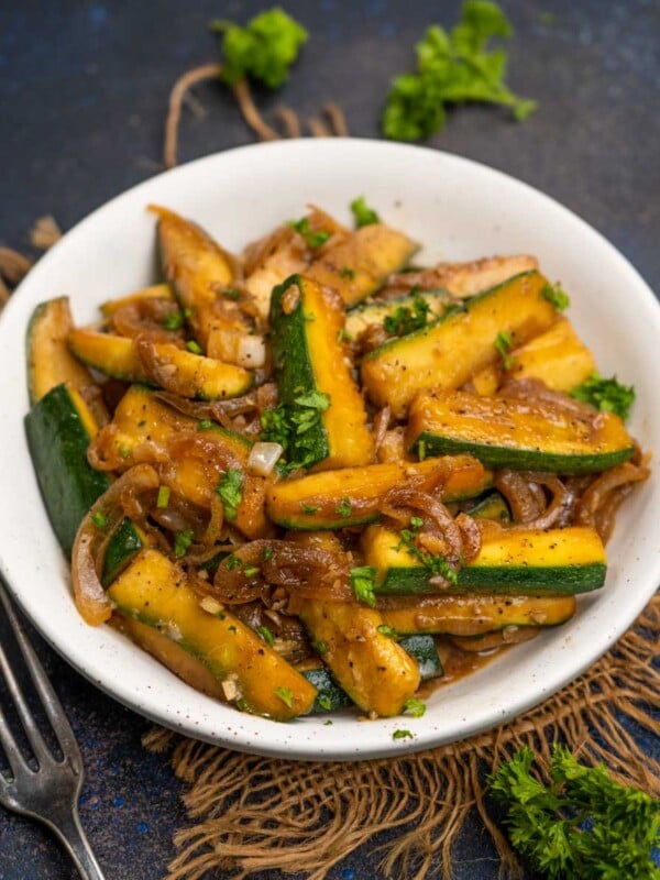 This Japanese Steakhouse-style Hibachi Zucchini comes together in 20 minutes using a few simple ingredients. Serve it on the side with your homemade Hibachi meal (vegetarian, can be easily made gluten-free).