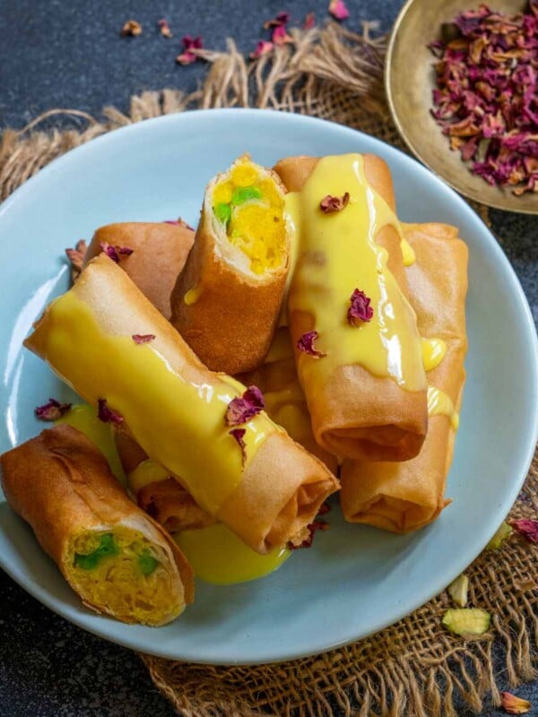 Motichoor Rolls is a delicious fusion dessert where crumbled motichoor ladoo (or boondi) is wrapped inside spring roll sheets and the rolls are deep fried until crispy. Try these this festive season (vegetarian).