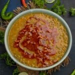 This Homestyle Green Moong Dal (Chilka Mung Dal) is a simple everyday lentil recipe where green moong lentil is cooked and tempered with a garlic tadka (vegetarian, can be easily made gluten-free).