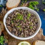 Mushroom Tapenade is an easy and delicious dip prepared with a handful of ingredients. It makes for a great party appetizer when served with nachos or topped over bruschetta (vegan, gluten-free).