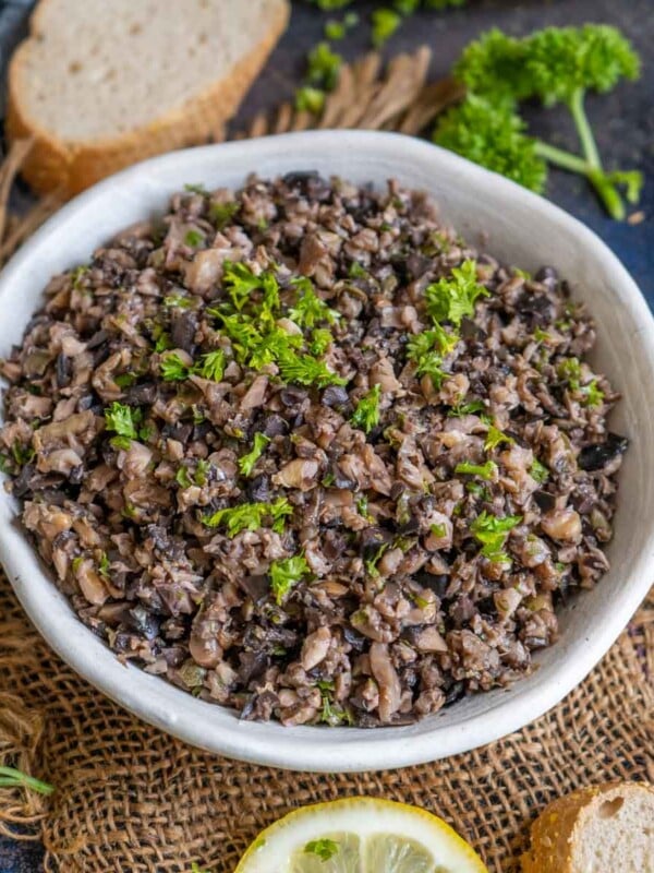Mushroom Tapenade is an easy and delicious dip prepared with a handful of ingredients. It makes for a great party appetizer when served with nachos or topped over bruschetta (vegan, gluten-free).
