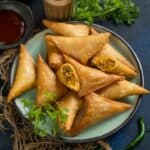 Make the best Mutton Keema Samosa at home using my easy recipe. Learn how to assemble and freeze the samosas in bulk.