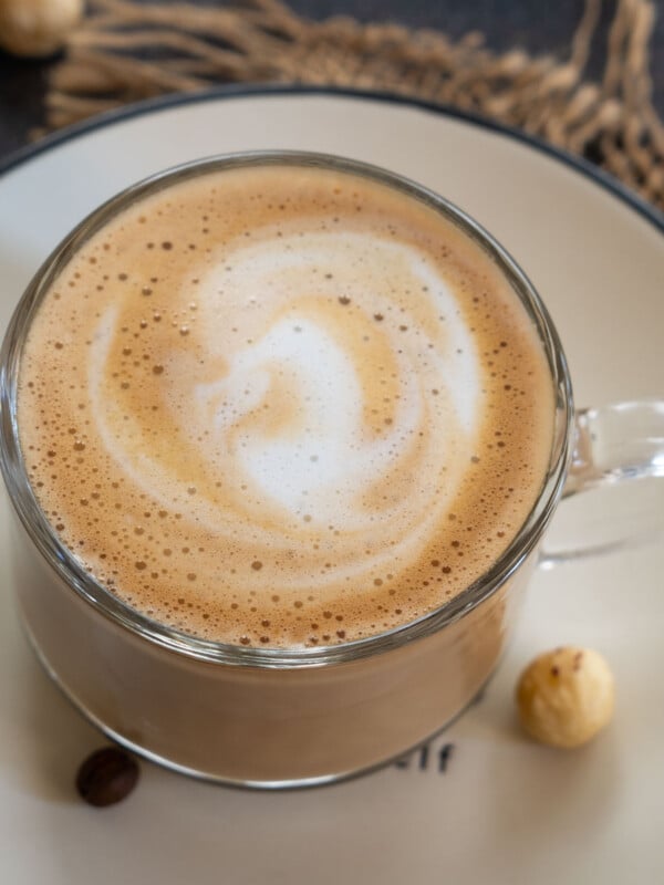 Make Starbucks Copycat Hazelnut Latte at home in under 5 minutes using 3 ingredients. This coffee drink is gluten-free and can be made vegan.