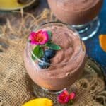 A few ingredients and 5 minutes are all you need to make this rich, creamy, and nutrition-packed Tropical Smoothie Cafe Copycat Blueberry Bliss Tropical Smoothie. Make it for your go-to breakfast, snack, or healthy dessert (gluten-free, can be made vegan).