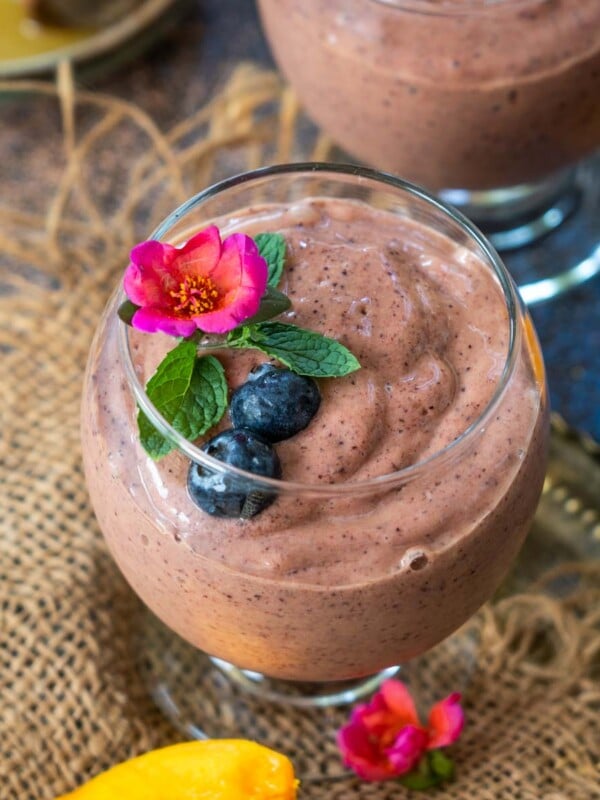 A few ingredients and 5 minutes are all you need to make this rich, creamy, and nutrition-packed Tropical Smoothie Cafe Copycat Blueberry Bliss Tropical Smoothie. Make it for your go-to breakfast, snack, or healthy dessert (gluten-free, can be made vegan).