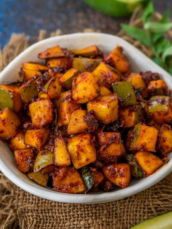 Phodnichi Kairi is a sweet and spicy Maharashtrian condiment made using raw mangoes, jaggery, and spices. Serve it with dal and bhakri for a comforting meal (vegan, can be made gluten-free).