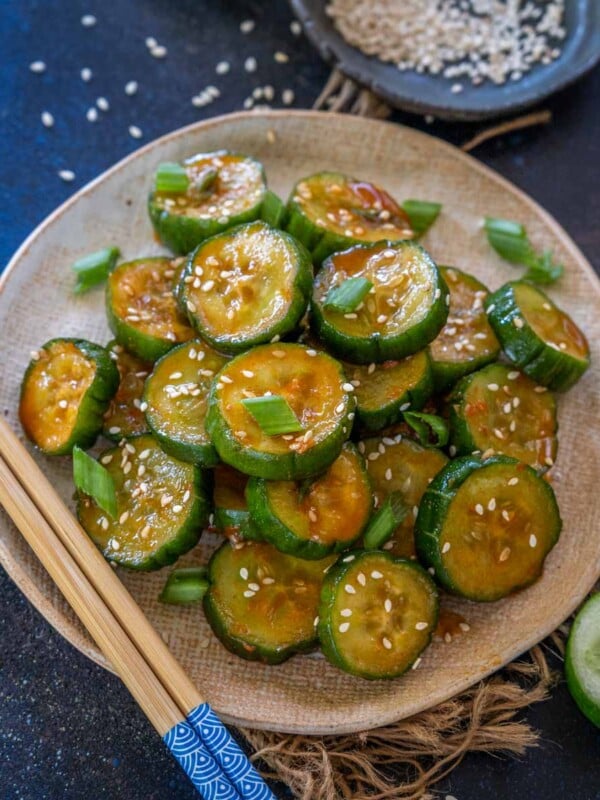 Gochujang Cucumber Salad is a crunchy Korean-style salad where sliced cucumbers are tossed in a sweet spicy gochujang dressing. Make it using my easy recipe.