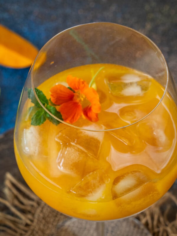 Mango Mai Tai is the classic Mai Tai cocktail flavored with mangoes. Make it using fresh or frozen mangoes using my easy recipe.